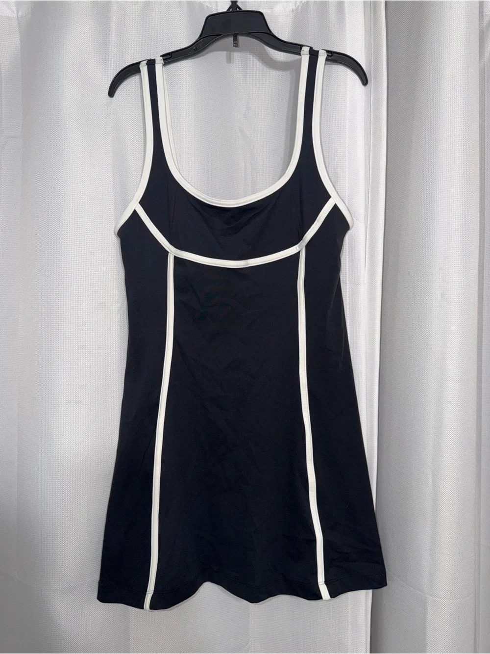 Daily Practice- Black workout dress with white trim and connected spandex shorts